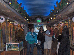 Inside the train, the walls were full of movie clip panels, display cases had memorabilia, and costumes gave added glamour.